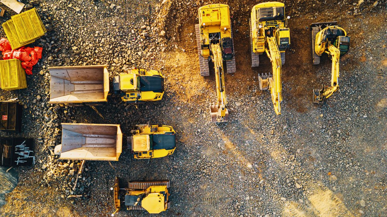 Constuction equipment in a gravel lot