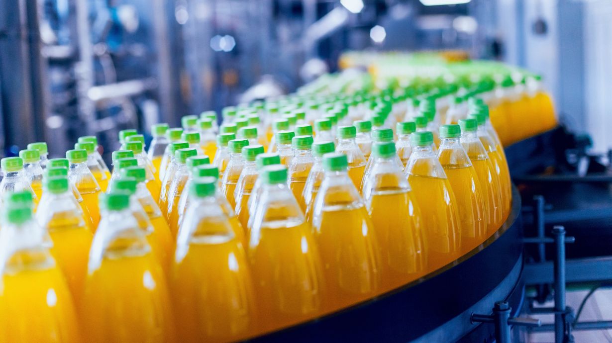 Orange Beverages on assembly line